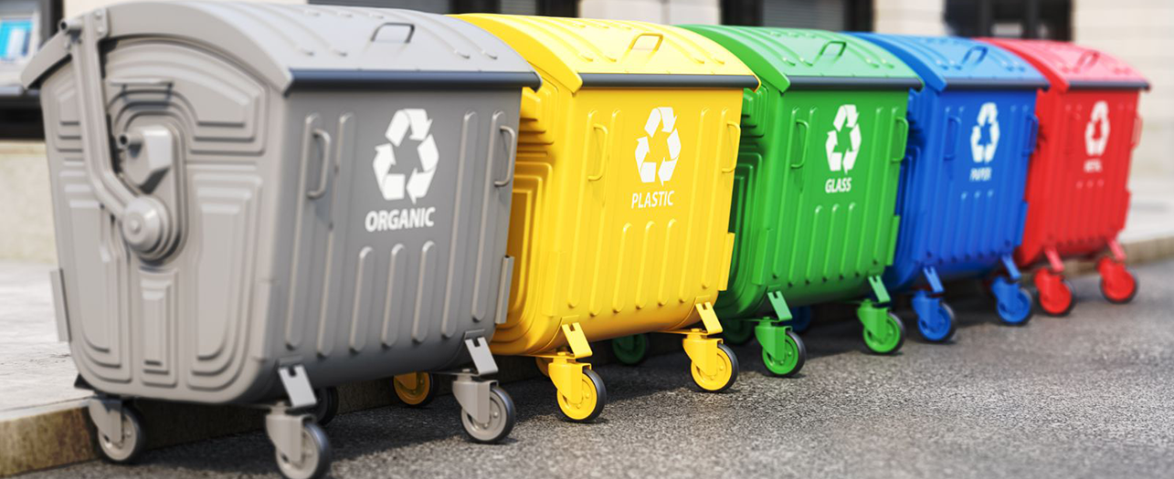 Color-coded recycling bins for waste separation